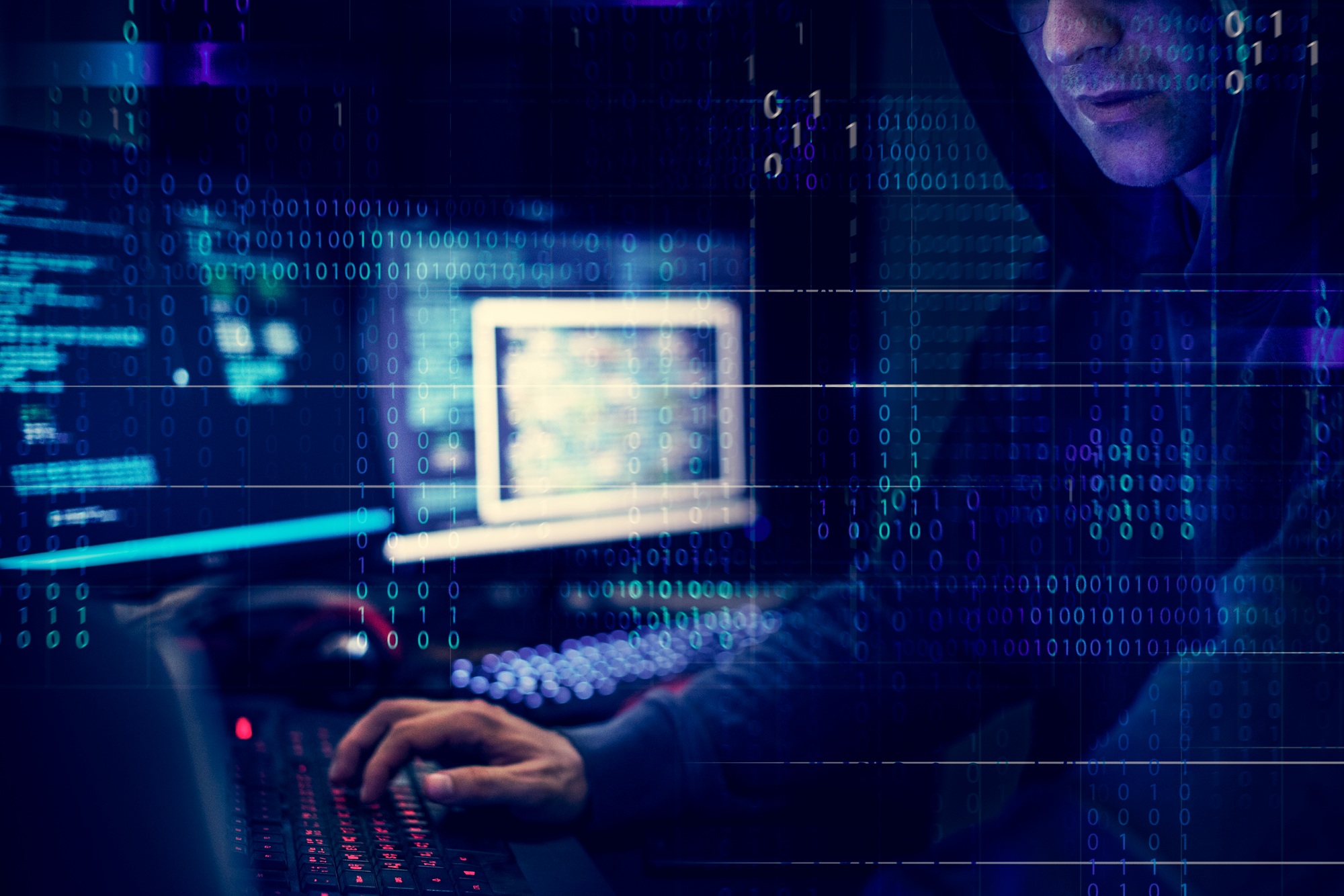 Hacker working using computer with codes